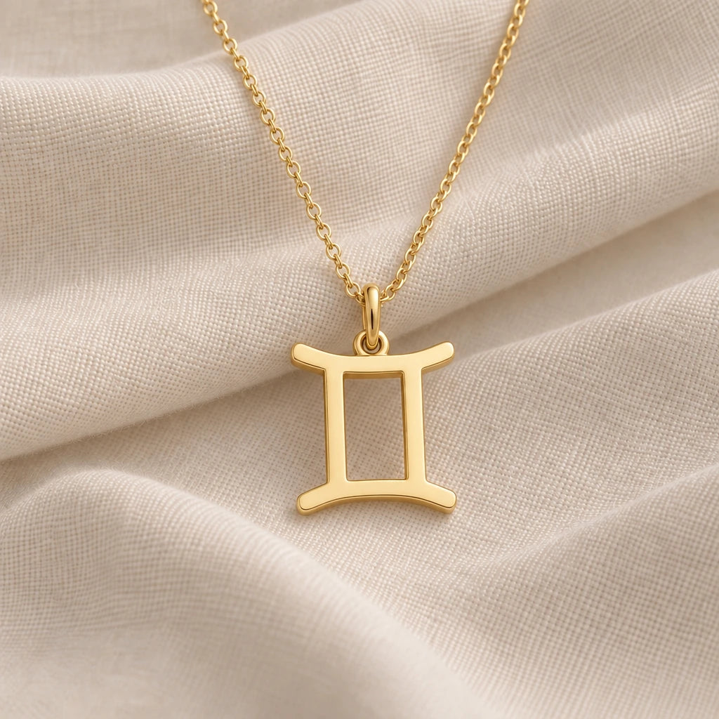 Gemini Zodiac Glyph pendant necklace in an 18k gold plated finish