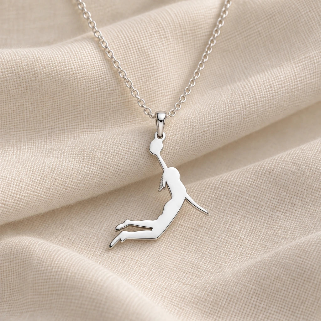 925 sterling silver female basketball player pendant necklace on cream fabric
