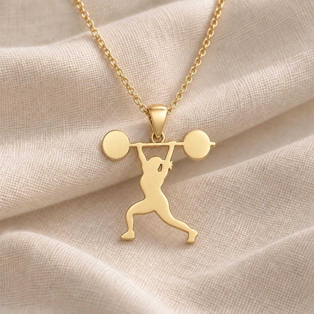 Weightlifter Overhead Press pendant necklace in an 18k gold plated finish