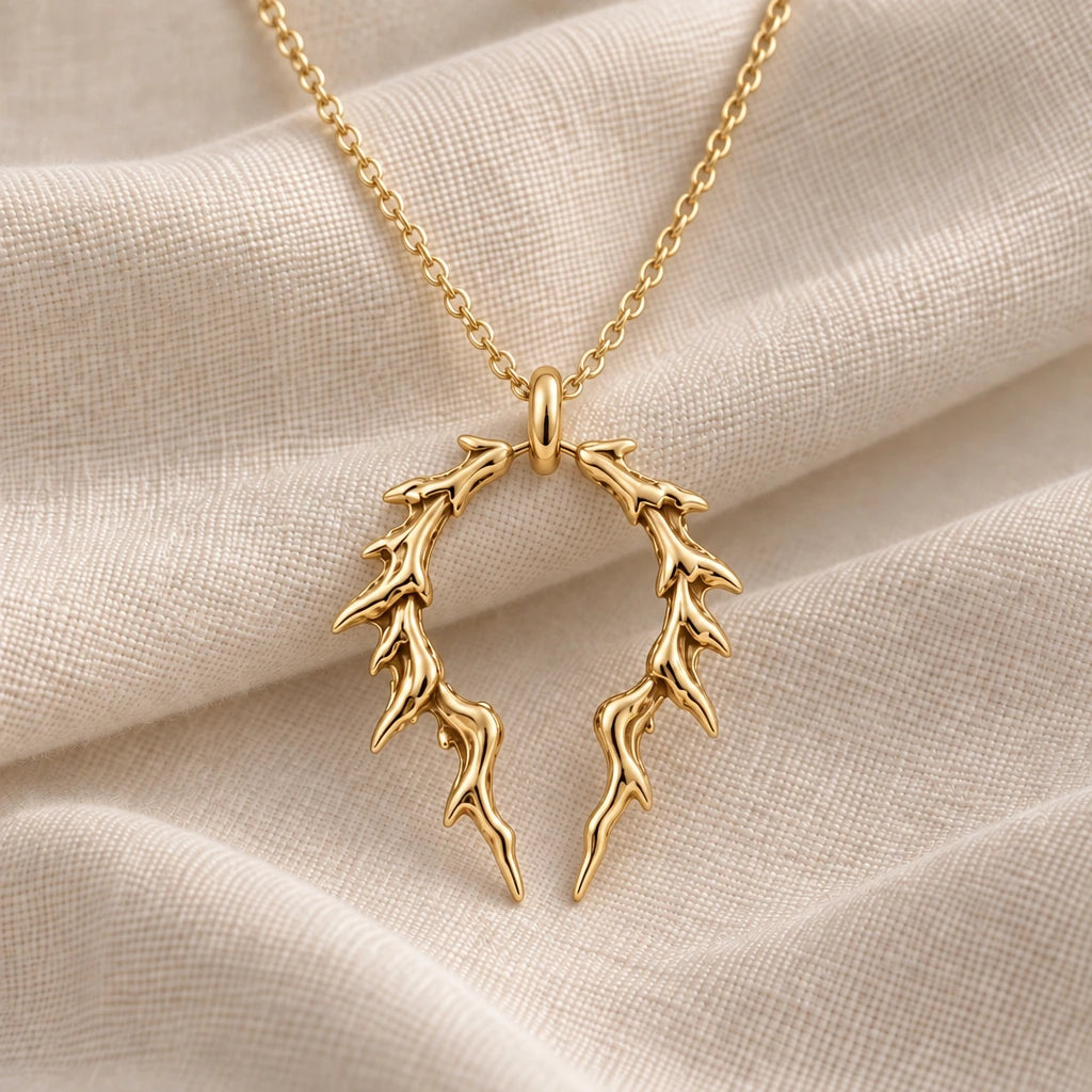 Broken Halo Thorn pendant necklace in an 18k gold plated finish