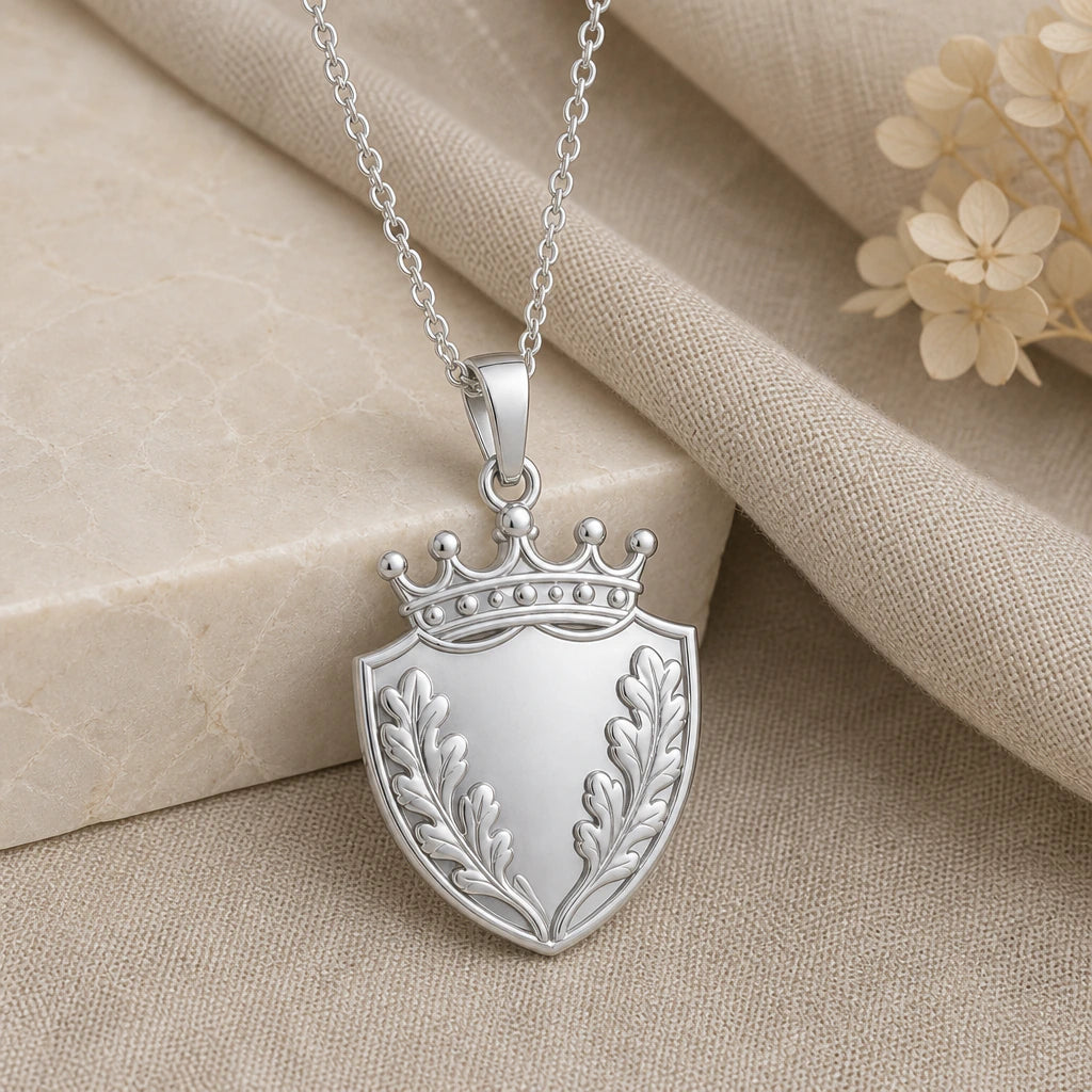 925 sterling silver oak leaf shield crown pendant necklace on softly folded cream linen