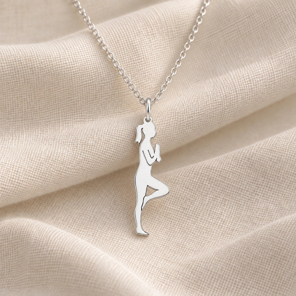 925 sterling silver yoga tree pose woman pendant necklace on cream fabric