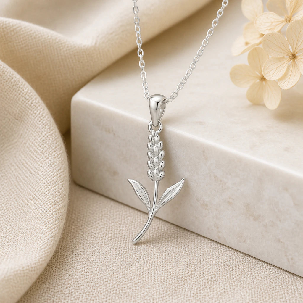 925 sterling silver lavender flower pendant necklace on softly folded cream linen