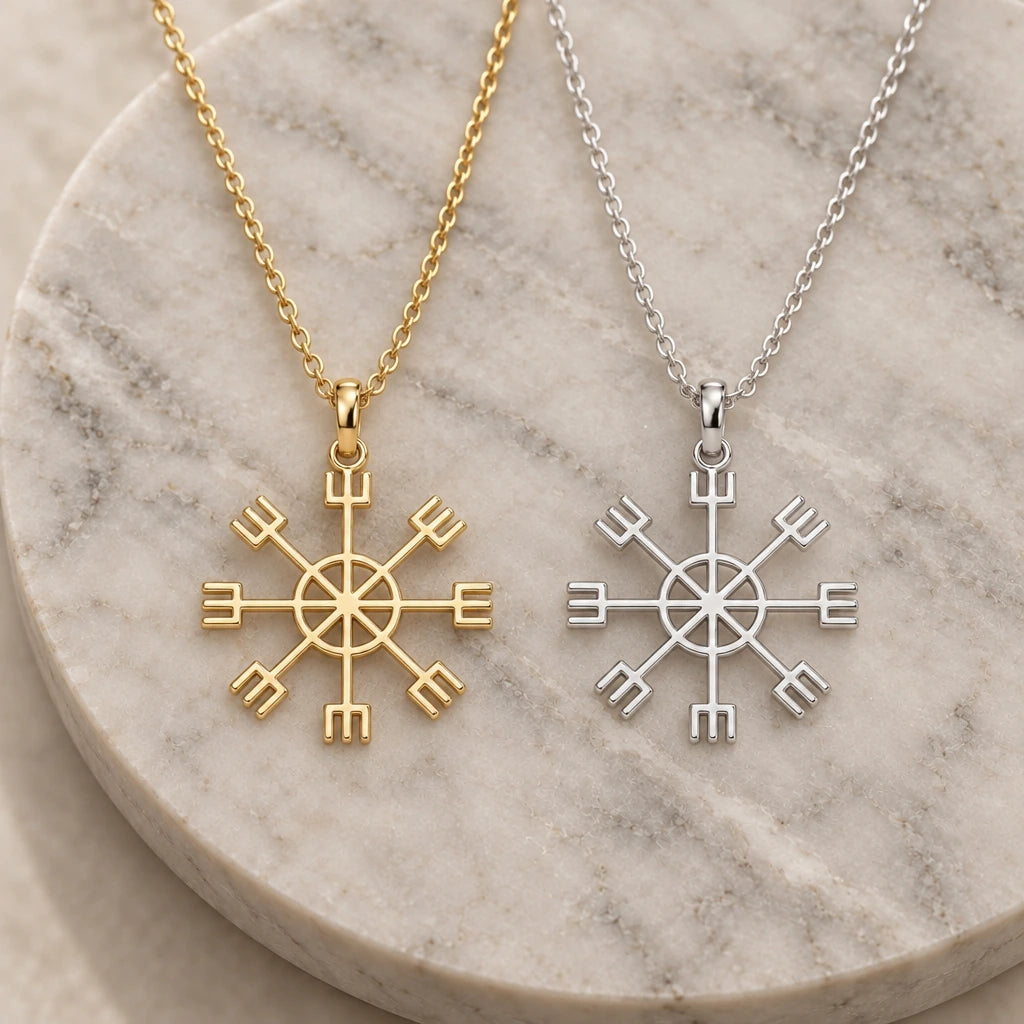 Vegvisir Sun Compass pendant necklace in silver and gold finishes side by side