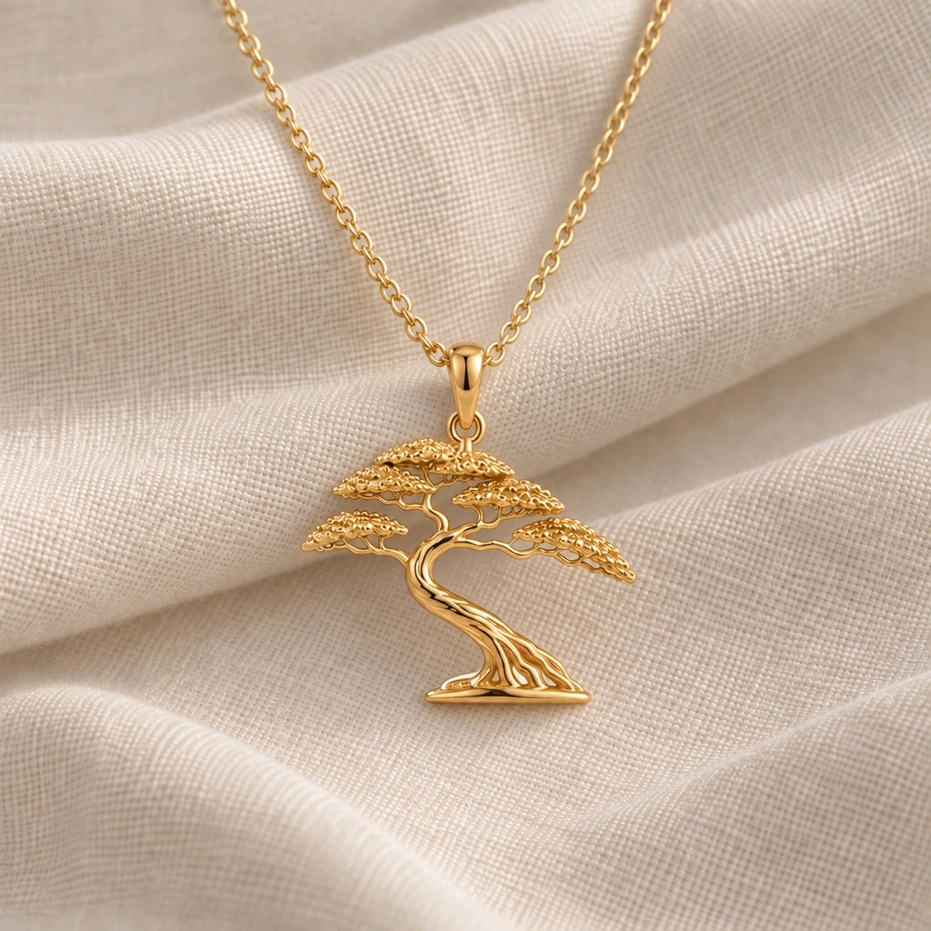Acacia Wind Bonsai pendant necklace in an 18k gold plated finish