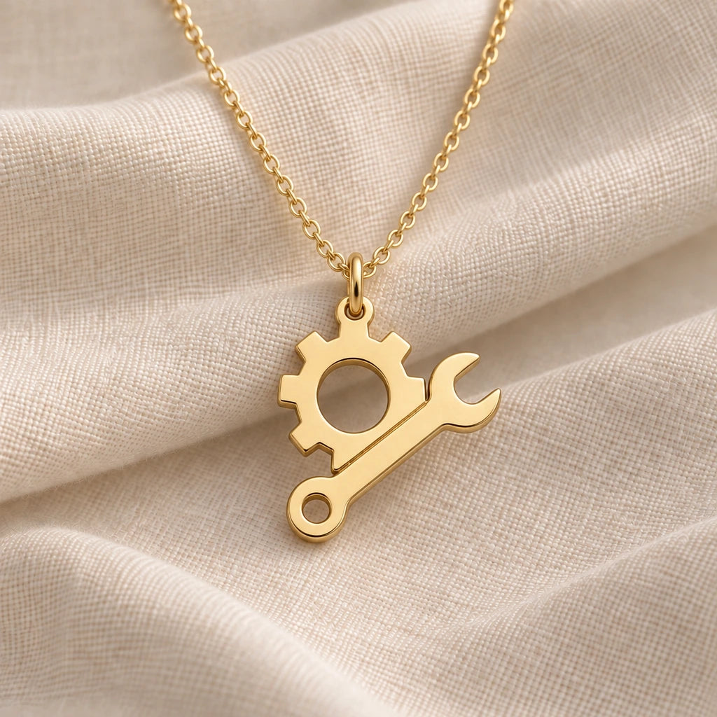 Engineer Gear and Spanner pendant necklace in an 18k gold plated finish