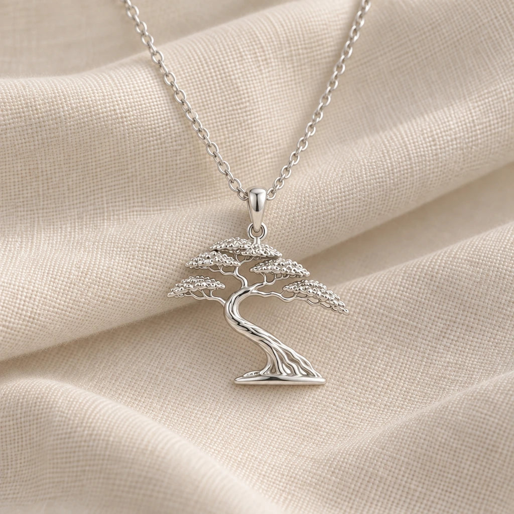 925 sterling silver acacia wind bonsai pendant necklace on cream fabric
