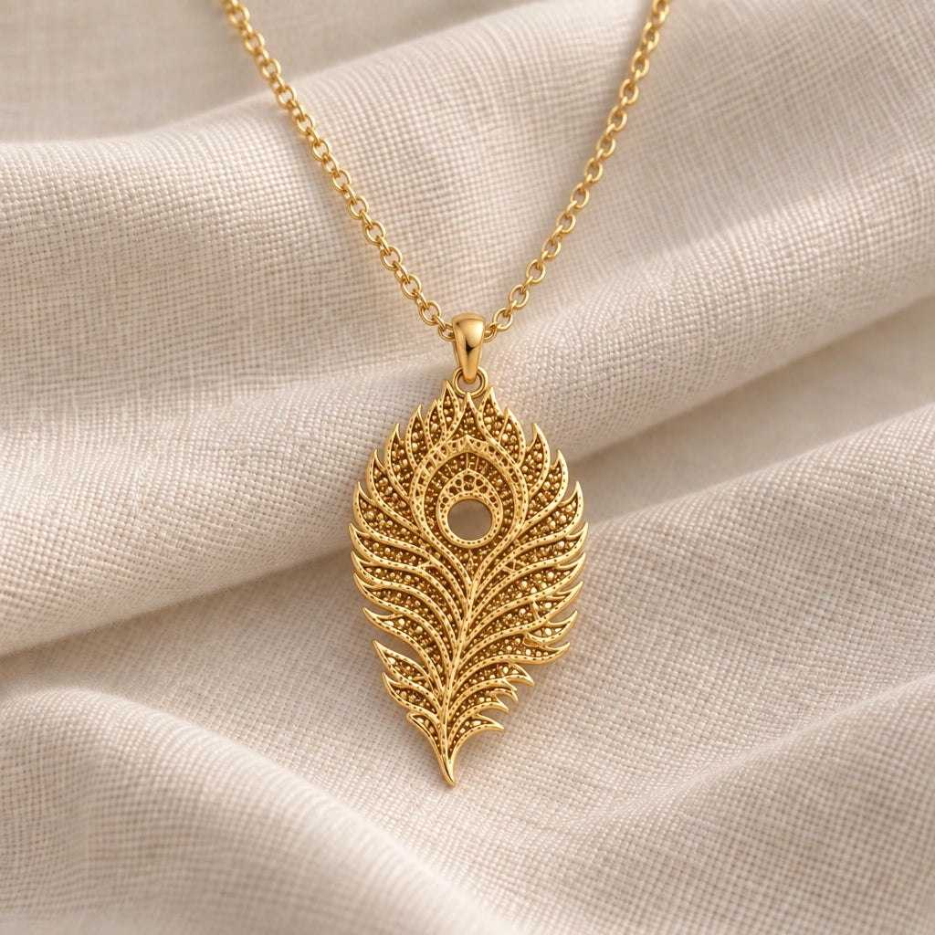 Lunar Peacock Feather pendant necklace in an 18k gold plated finish