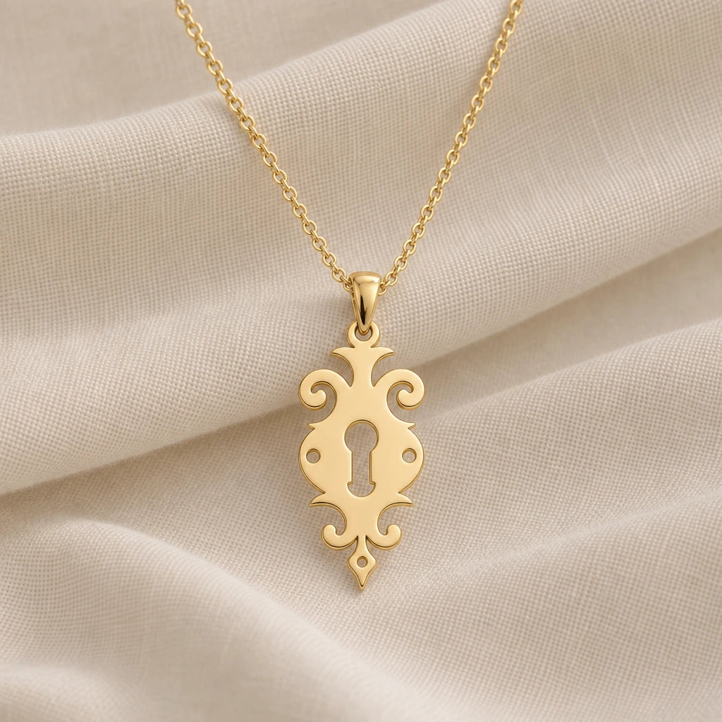 Ornate Keyhole pendant necklace in an 18k gold plated finish