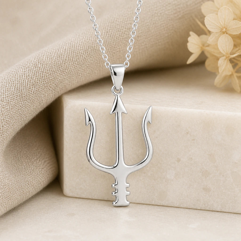 925 sterling silver neptune trident pendant necklace on softly folded cream linen