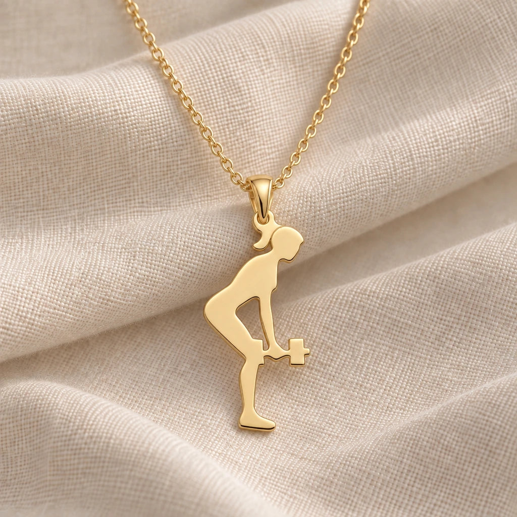 Dumbbell Row Woman pendant necklace in an 18k gold plated finish