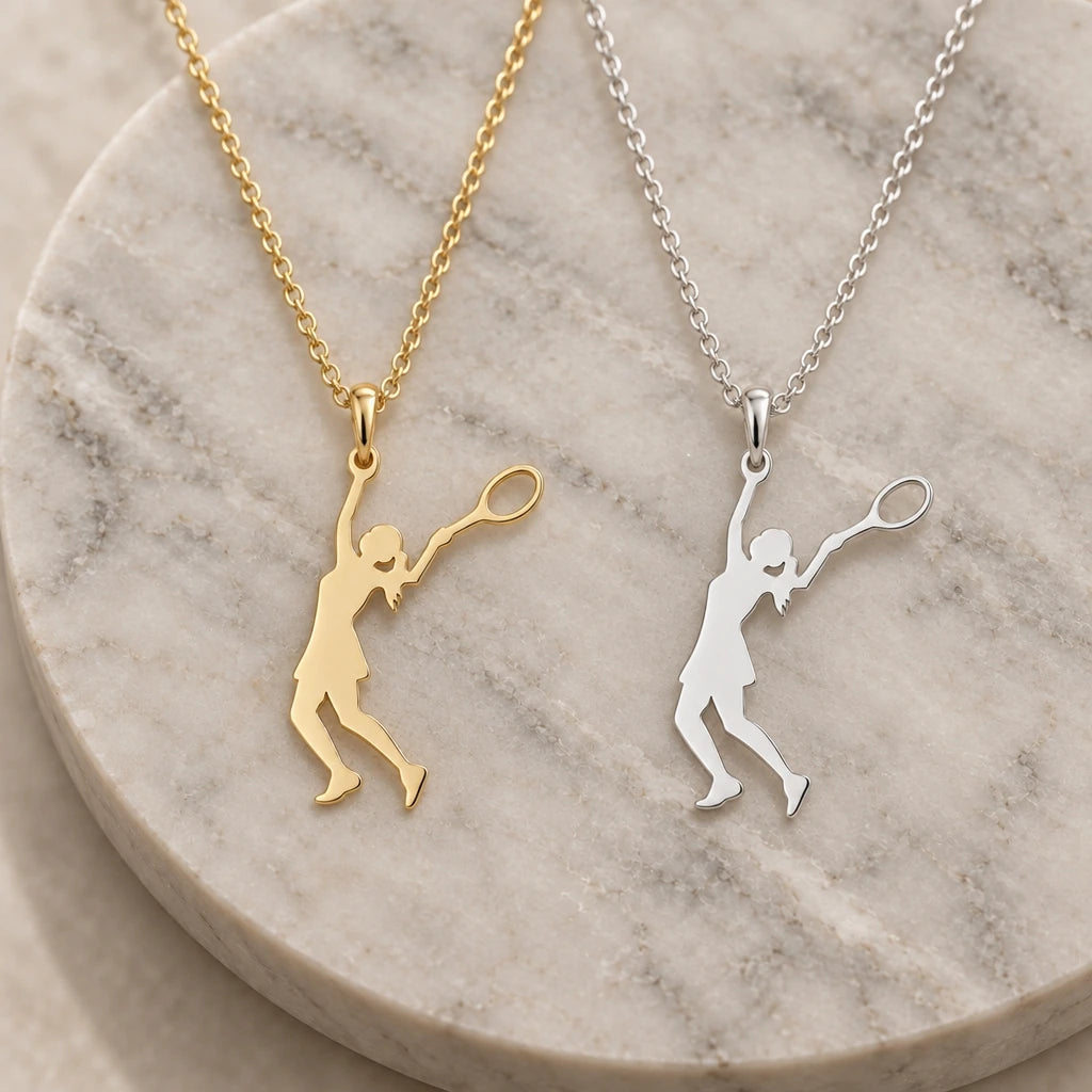 Tennis Player Serve pendant necklace in silver and gold finishes side by side