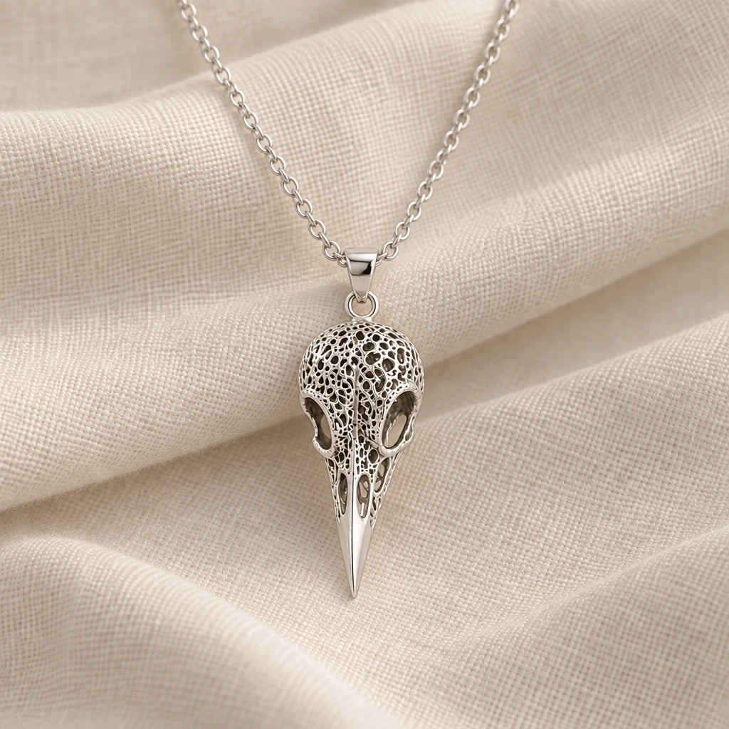 925 sterling silver raven skull relic pendant necklace on cream fabric