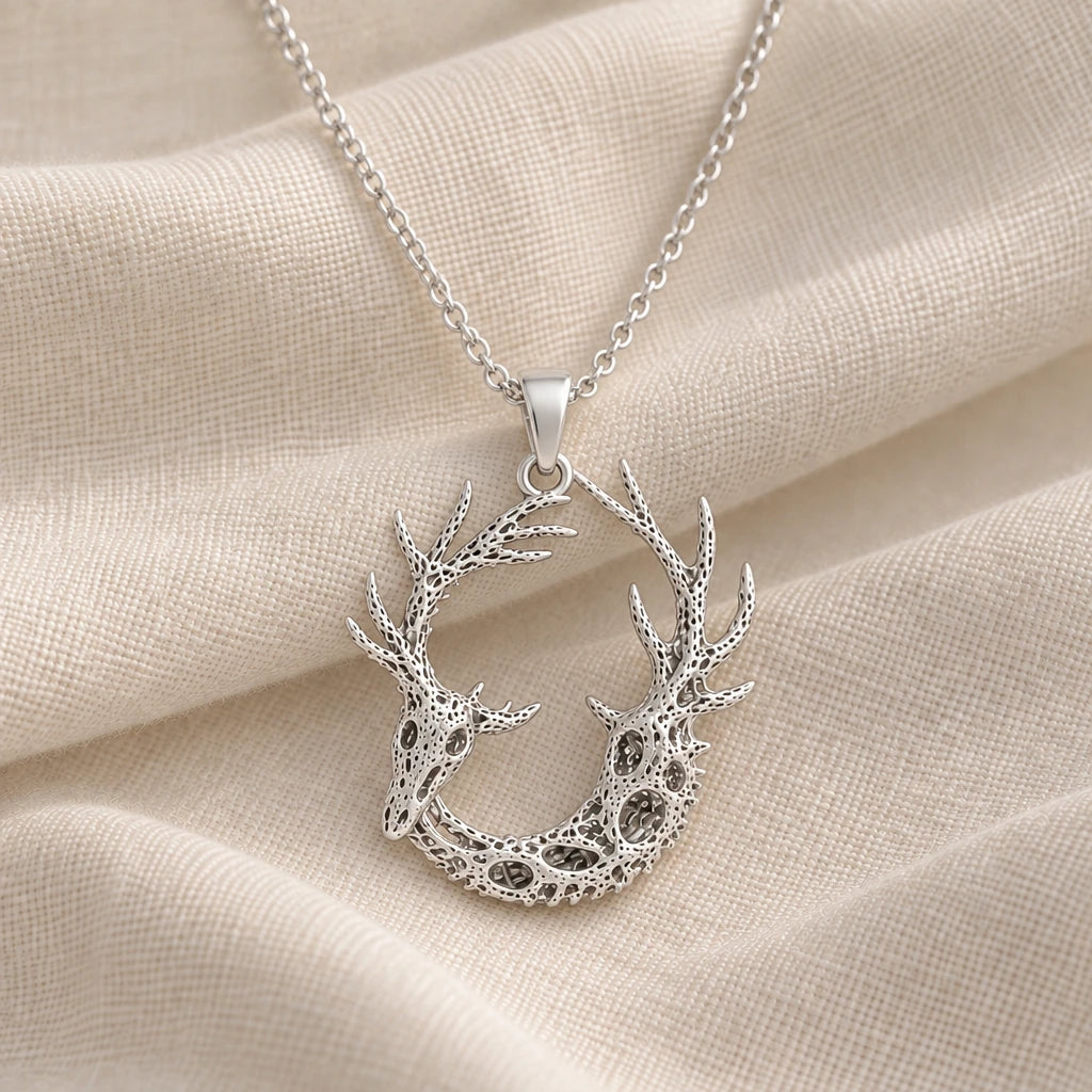 925 sterling silver fossil deer antler ring pendant necklace on cream fabric