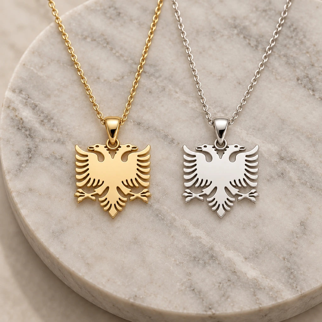 Albanian Double Headed Eagle pendant necklace in silver and gold finishes side by side