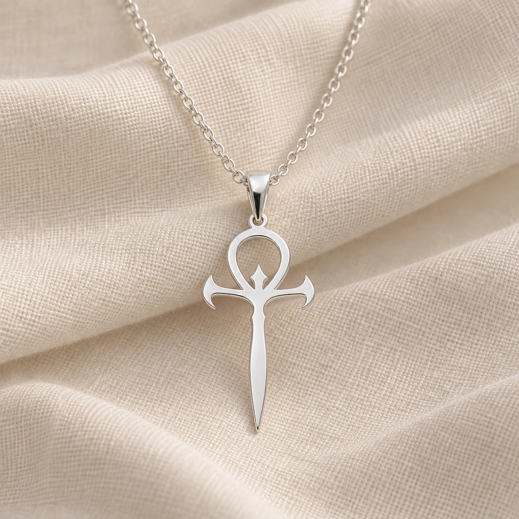 925 sterling silver gothic ankh dagger pendant necklace on cream fabric