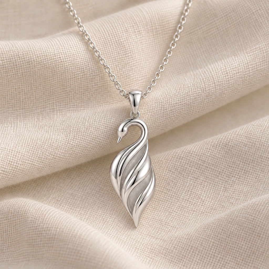 925 sterling silver swan veil pendant necklace on cream fabric