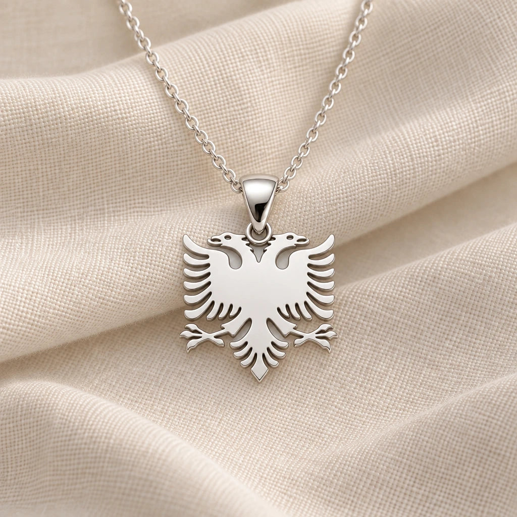 925 sterling silver albanian double headed eagle pendant necklace on cream fabric