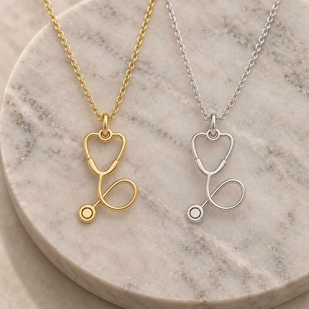 Stethoscope Charm pendant necklace in silver and gold finishes side by side