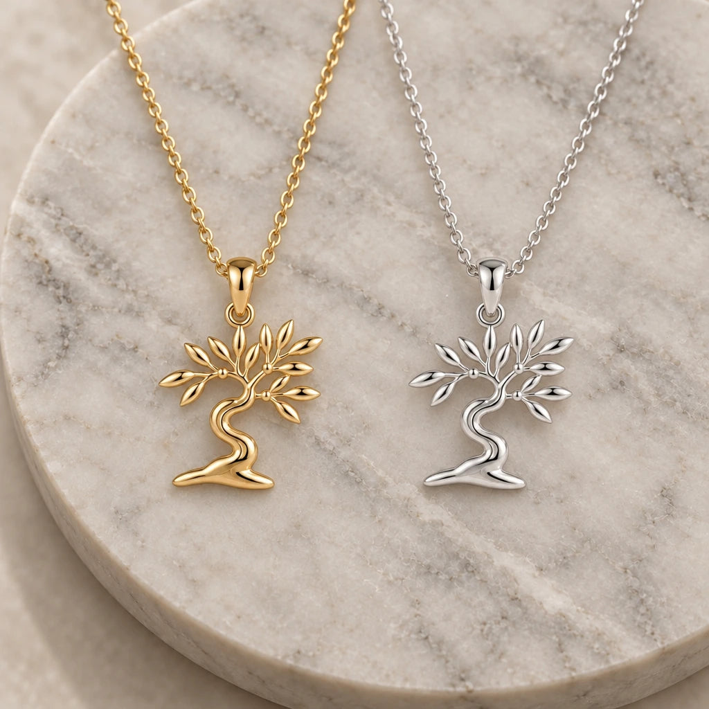 Olive Drift Bonsai pendant necklace in silver and gold finishes side by side