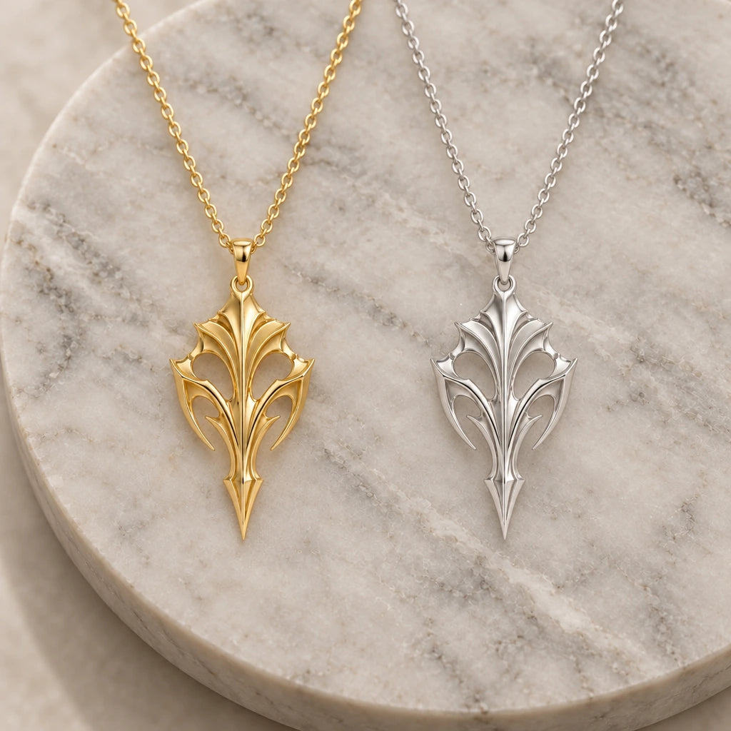 Eclipse Armour Blade pendant necklace in silver and gold finishes side by side
