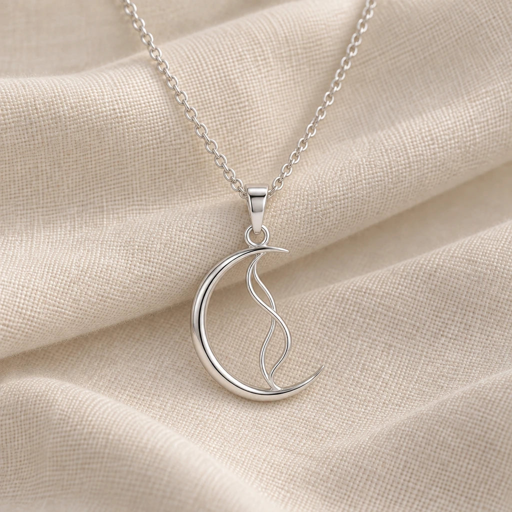 925 sterling silver whisper crescent vine pendant necklace on cream fabric