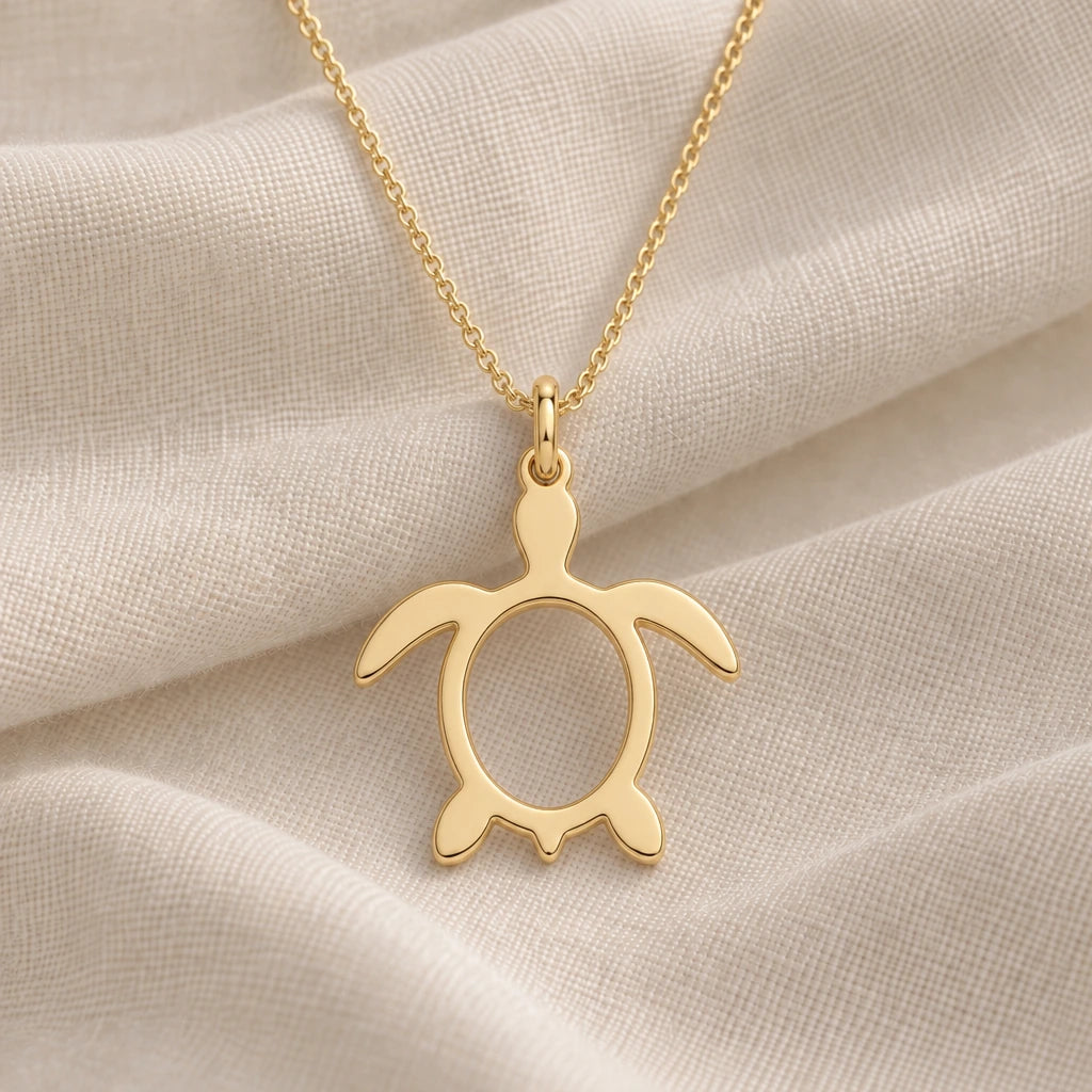 Sea Turtle Outline pendant necklace in an 18k gold plated finish