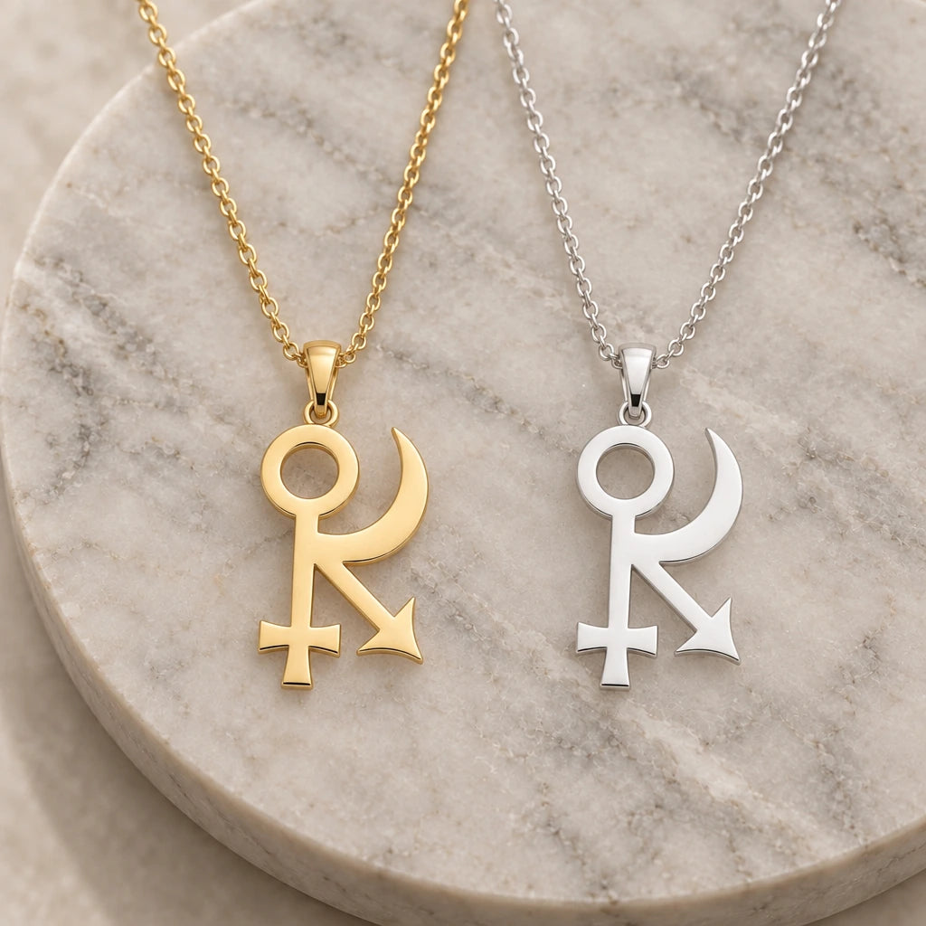 Sphinx Asteroid Symbol pendant necklace in silver and gold finishes side by side
