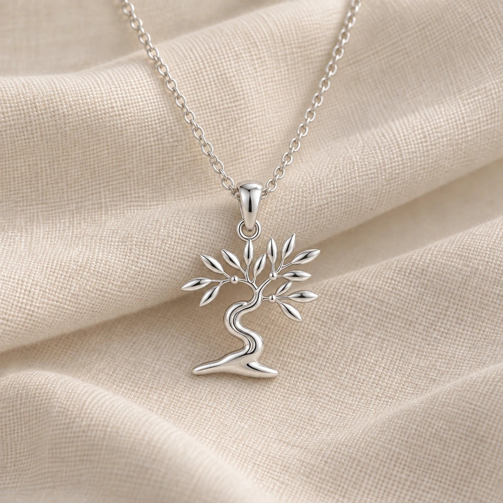 925 sterling silver olive drift bonsai pendant necklace on cream fabric