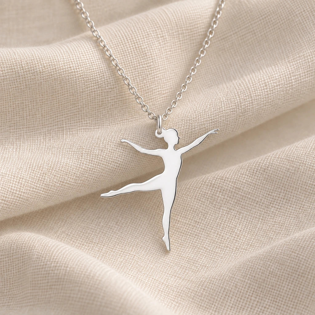 925 sterling silver ballet dancer arabesque pendant necklace on cream fabric