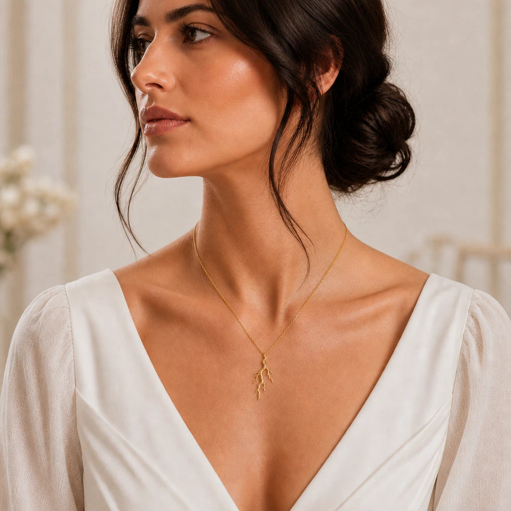 Lightning bolt pendant necklace worn by a model