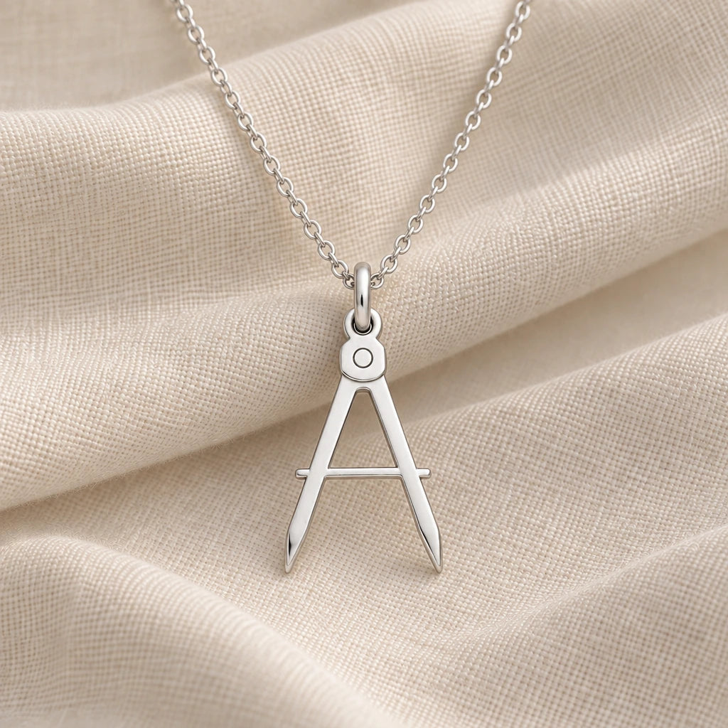 925 sterling silver architect compass brushed pendant necklace on cream fabric