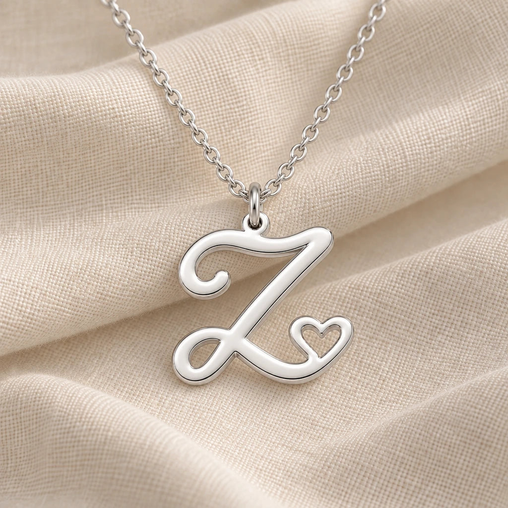 925 sterling silver z initial heart pendant necklace on softly folded cream linen