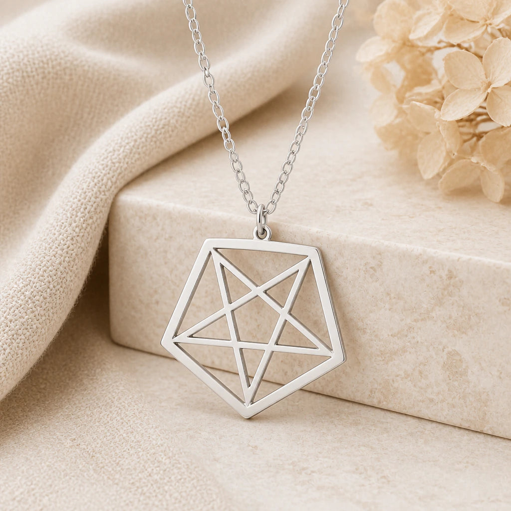 925 sterling silver inverted pentagram pendant necklace on softly folded cream linen