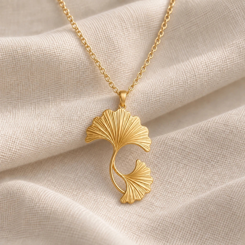Ginkgo Fan Leaves pendant necklace in an 18k gold plated finish