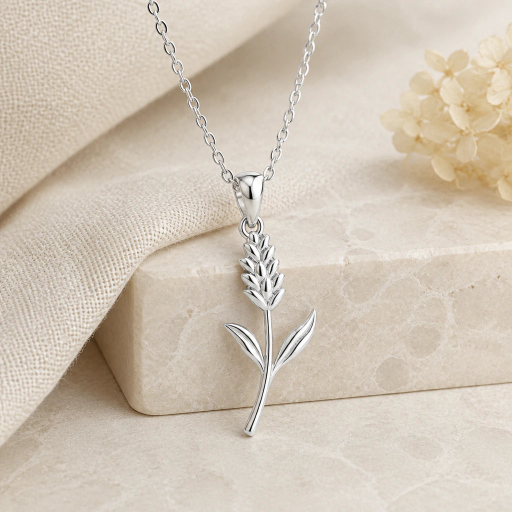 925 sterling silver statice flower pendant necklace on softly folded cream linen