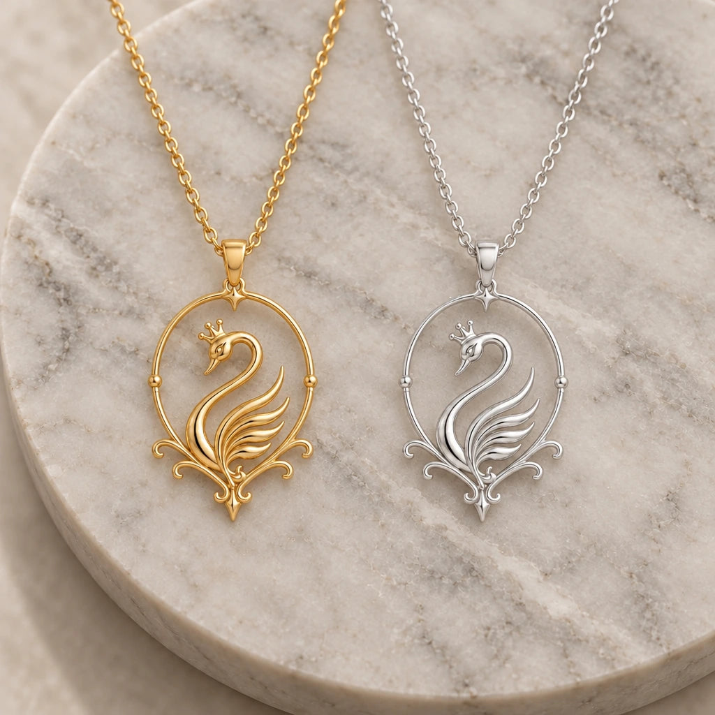 Swan Aura pendant necklace in silver and gold finishes side by side