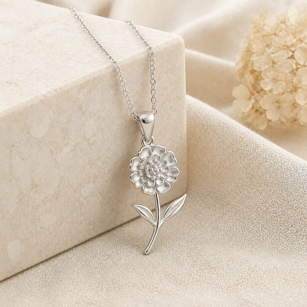 925 sterling silver lantana flower pendant necklace on softly folded cream linen