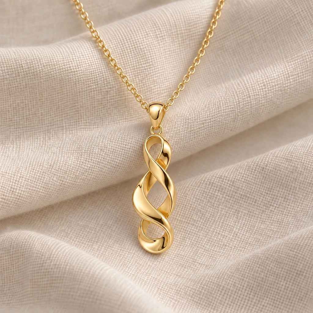 Sculptural Twisted Ribbon pendant necklace in an 18k gold plated finish