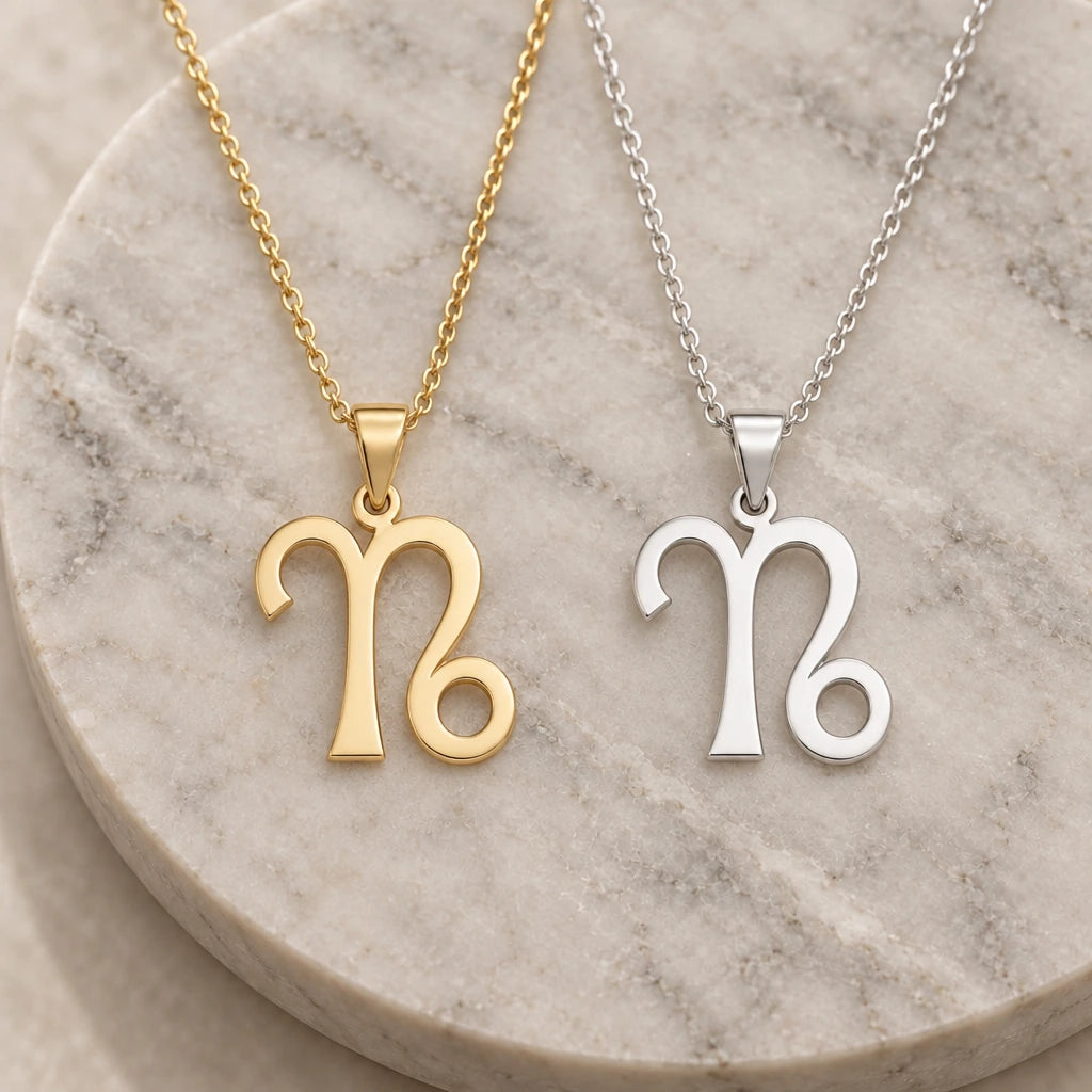 Capricorn Zodiac Glyph pendant necklace in silver and gold finishes side by side