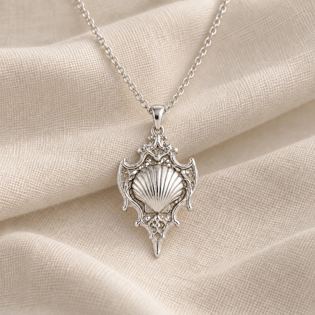 925 sterling silver sacred shell relic pendant necklace on cream fabric