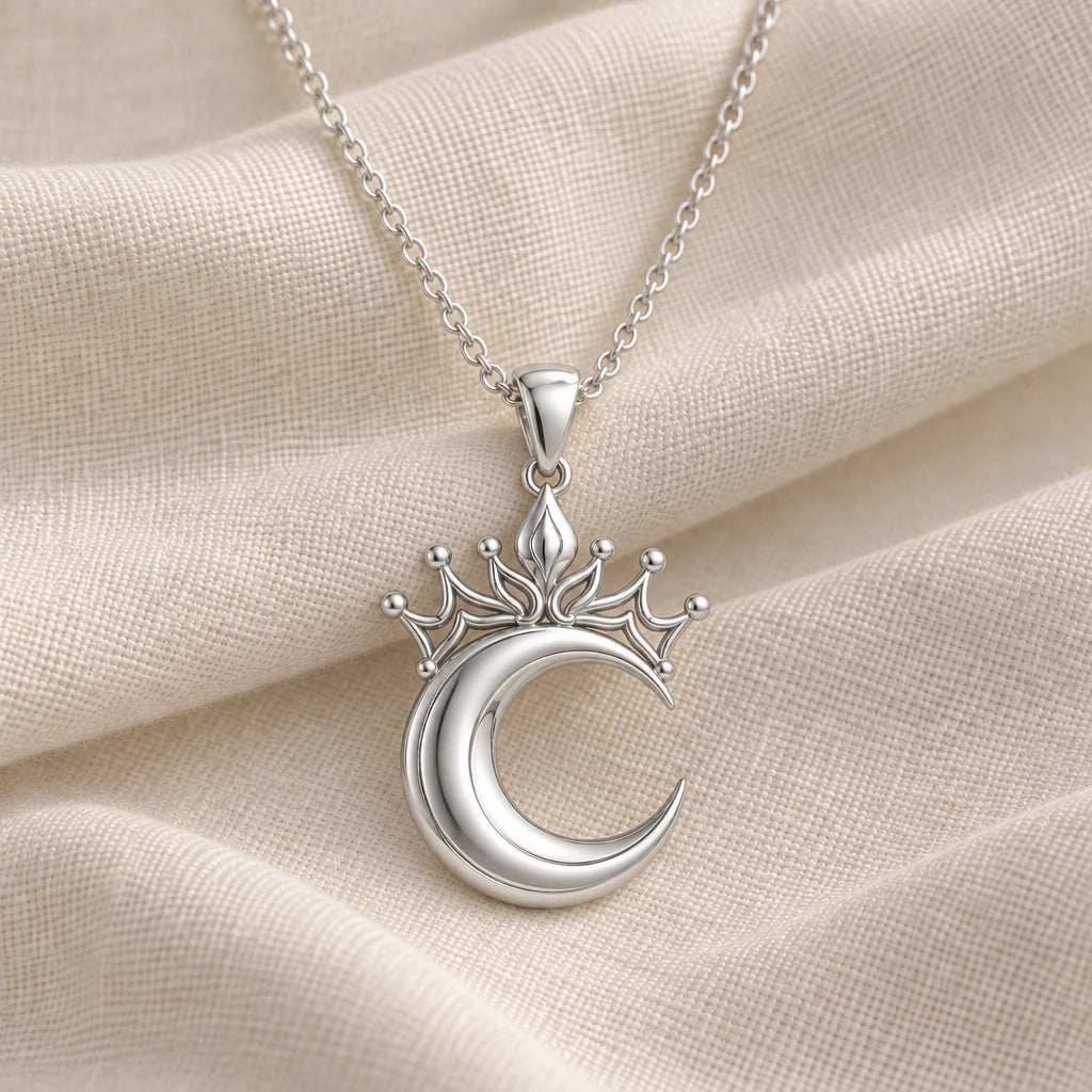 925 sterling silver lunar queen crowned moon pendant necklace on cream fabric