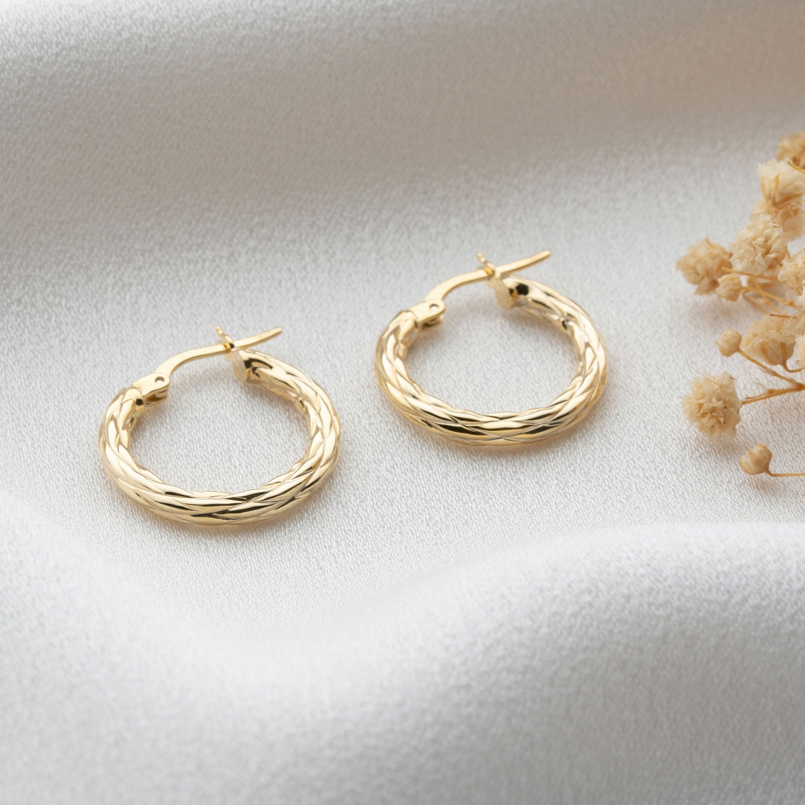 Gold twist hoop earrings