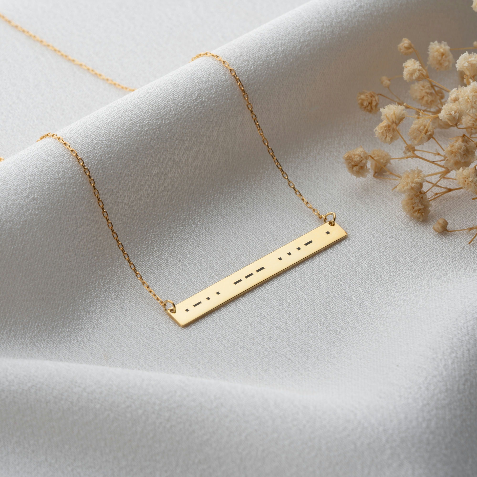 Bar necklace with morse codes