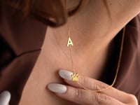 Sideway Initial And Dog Paw Necklace