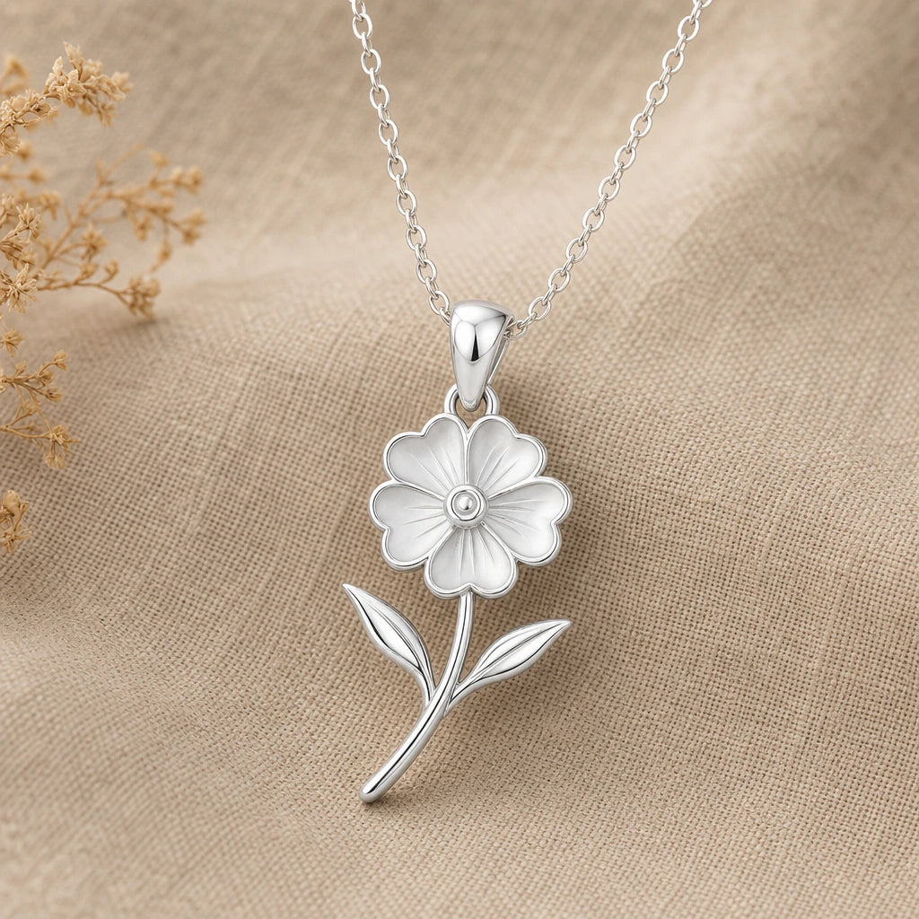 Detailed silver primrose flower pendant necklace with textured petals stem and leaves
