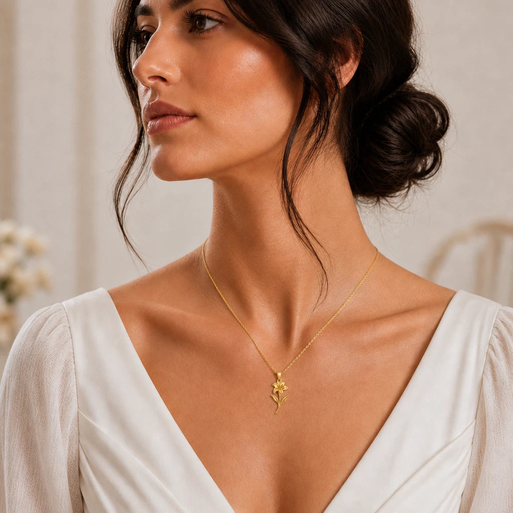 Canna flower pendant necklace in polished sterling silver on cream linen