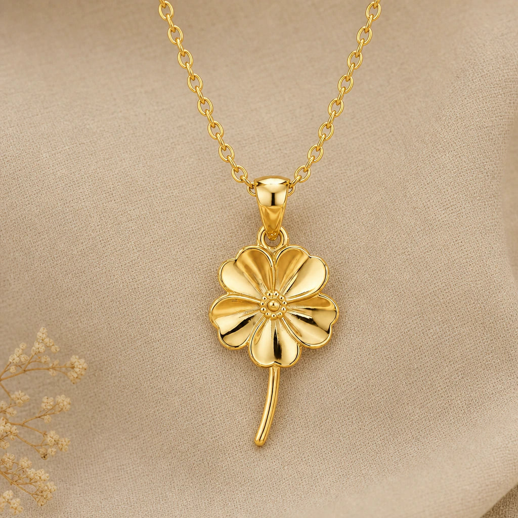 Forget me not flower pendant necklace in 18k gold plated sterling silver on linen