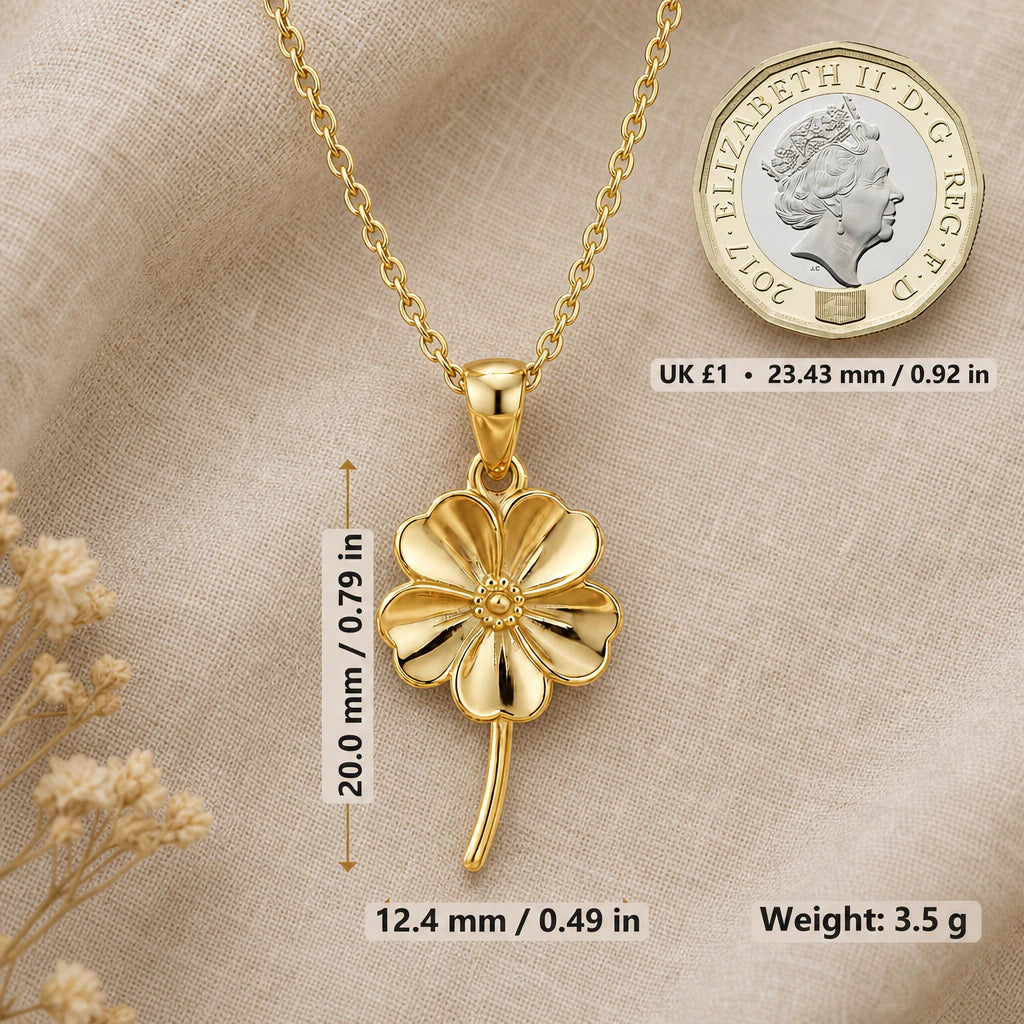 Forget me not necklace size image showing 20 mm height, 12.4 mm width and 3.5 g weight beside a UK pound coin