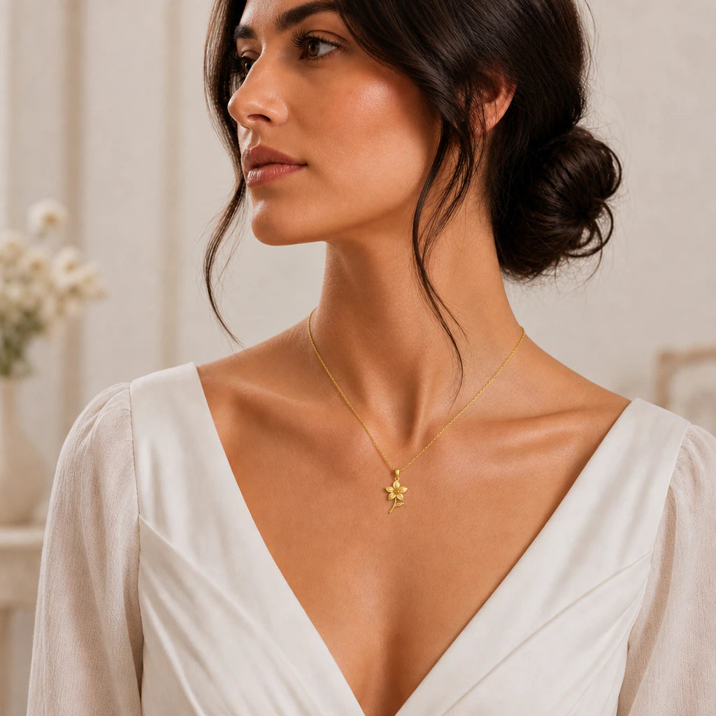 Clematis flower pendant necklace worn by a model